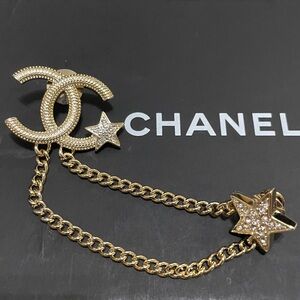 Chanel “CC” Brooch
